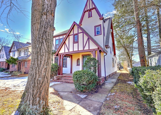 tudor home with stucco siding