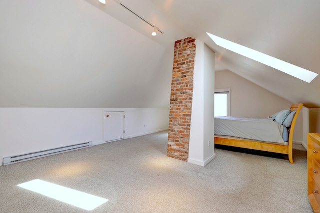 bonus room with lofted ceiling with skylight, a baseboard radiator, carpet flooring, and baseboards