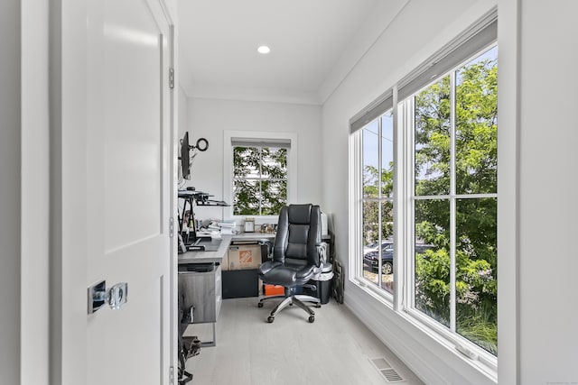 office with recessed lighting, light wood-style flooring, visible vents, and ornamental molding
