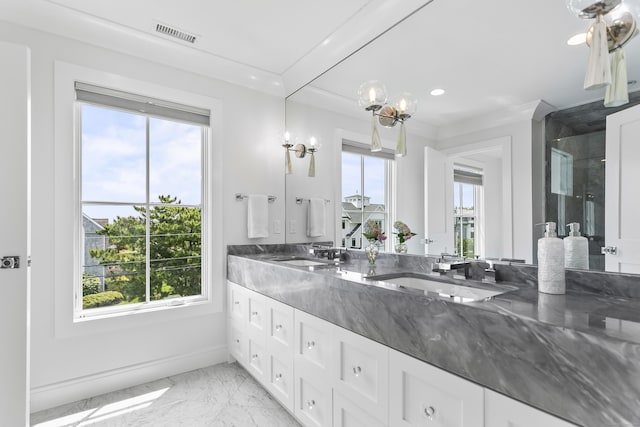bathroom with recessed lighting, visible vents, marble finish floor, and a sink