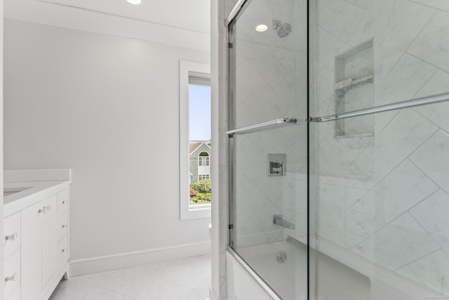 full bathroom with recessed lighting, vanity, baseboards, and combined bath / shower with glass door