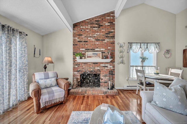 living room with lofted ceiling, a brick fireplace, a baseboard radiator, and wood finished floors