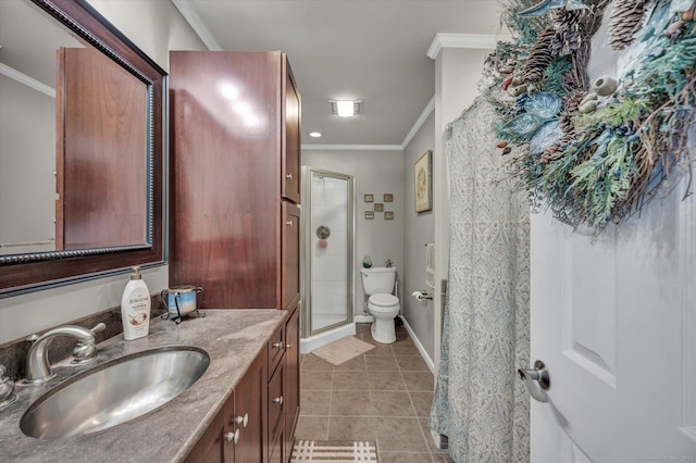 full bathroom featuring tile patterned flooring, toilet, vanity, a stall shower, and crown molding