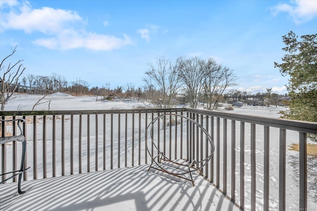 view of snow covered deck