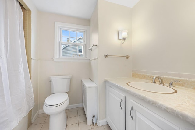 full bathroom with curtained shower, tile patterned flooring, toilet, vanity, and baseboards