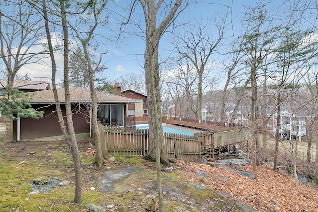 view of yard featuring fence