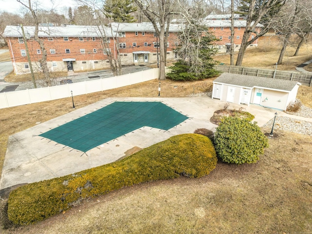 view of swimming pool with fence private yard and a patio