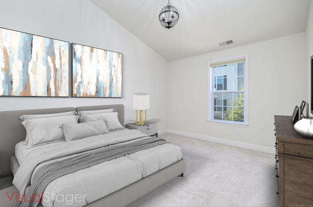 bedroom featuring light carpet, visible vents, baseboards, and lofted ceiling