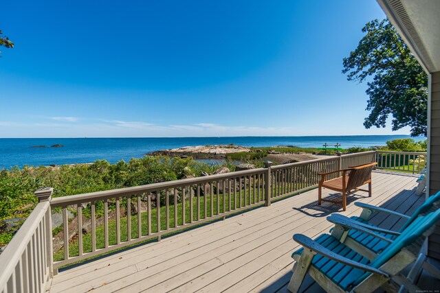 deck featuring a water view