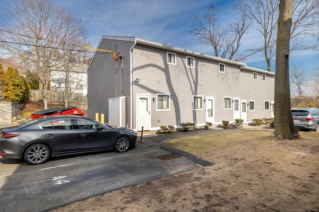 view of front of home with uncovered parking