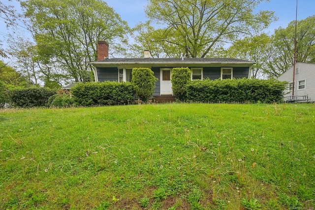 view of front of property featuring a chimney