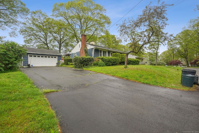 single story home with a front lawn
