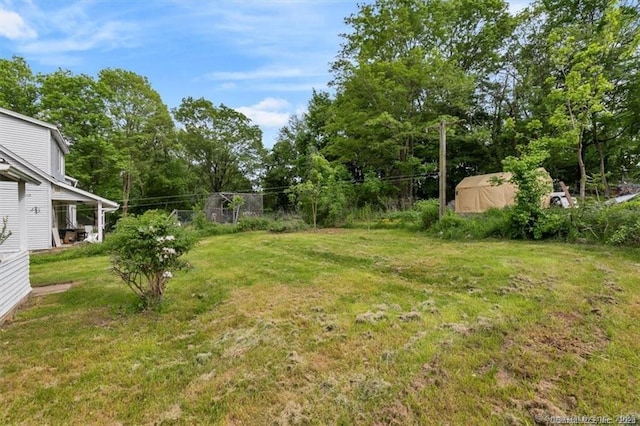 view of yard with fence