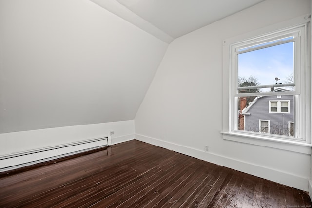 bonus room with baseboard heating, baseboards, dark wood finished floors, and lofted ceiling