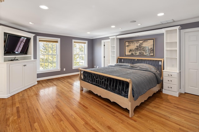 bedroom featuring light wood-type flooring, baseboards, and ornamental molding