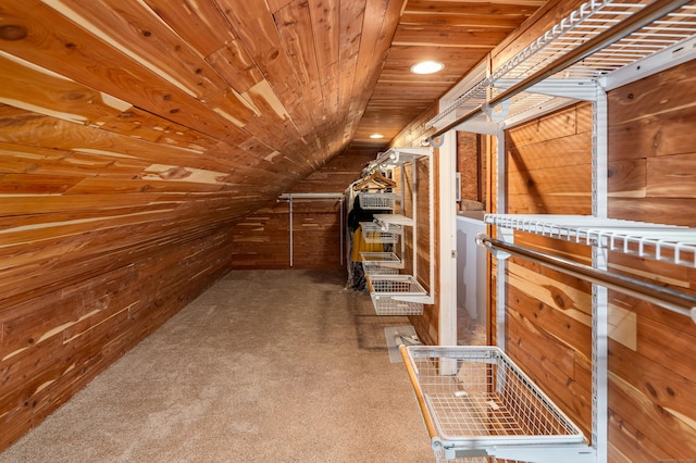 interior space featuring lofted ceiling and carpet floors