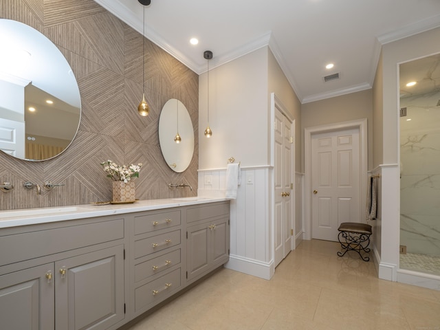 bathroom with crown molding, a marble finish shower, double vanity, recessed lighting, and visible vents