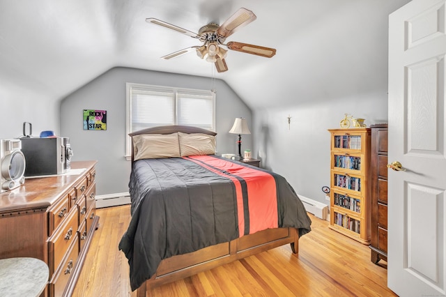 bedroom with a ceiling fan, lofted ceiling, light wood-style flooring, and baseboard heating