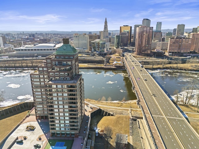 bird's eye view featuring a view of city and a water view