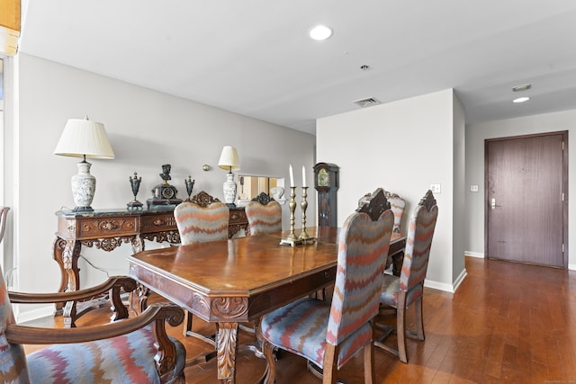 dining room featuring recessed lighting, visible vents, baseboards, and hardwood / wood-style flooring