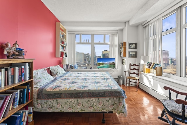 bedroom featuring a textured ceiling