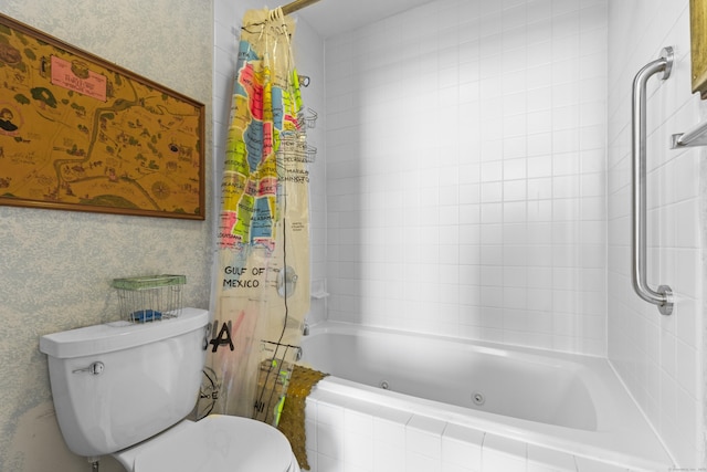 full bath with toilet, wallpapered walls, and a combined bath / shower with jetted tub