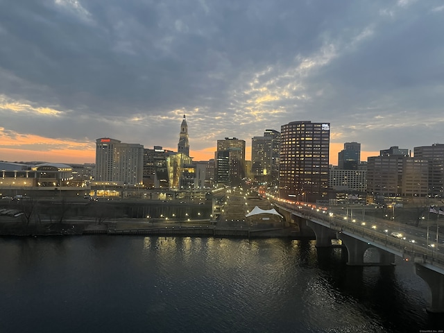 property's view of city with a water view