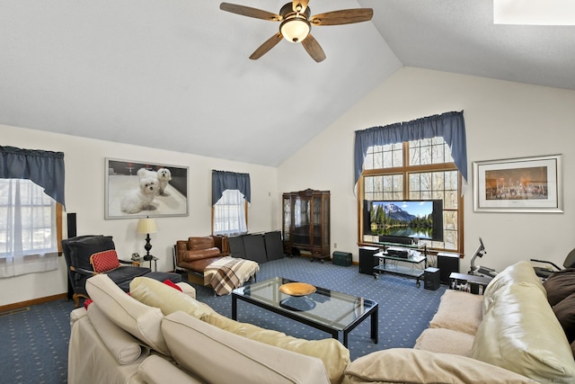 carpeted living area with vaulted ceiling, baseboards, and ceiling fan