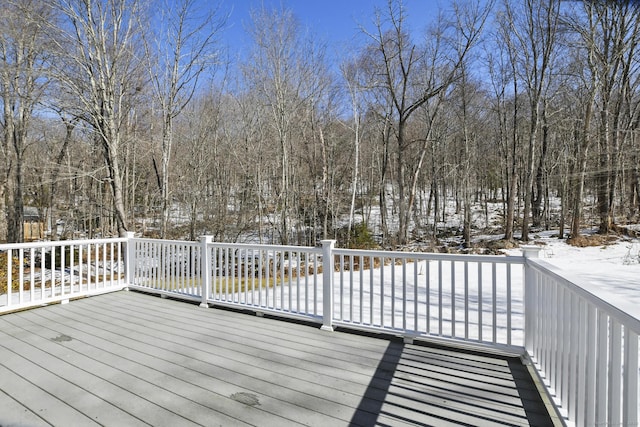 view of snow covered deck