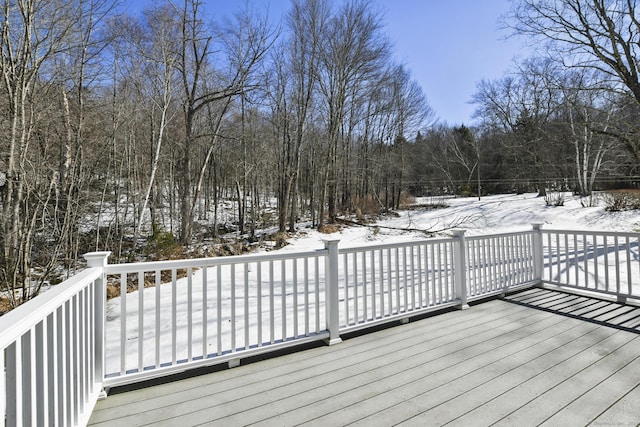 view of snow covered deck