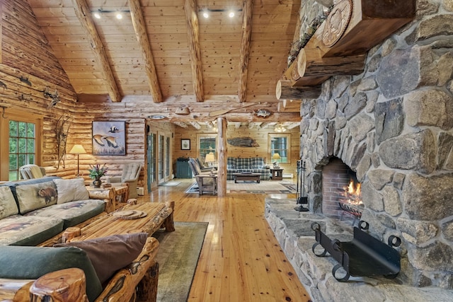 living room featuring high vaulted ceiling, wooden ceiling, light wood-style flooring, log walls, and beam ceiling