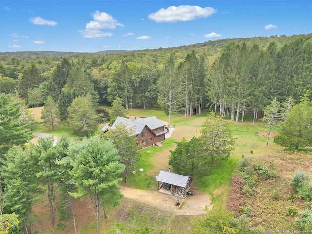 bird's eye view featuring a forest view