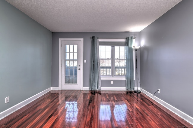 75 Redwood Dr Unit 510, East Haven, CT 06513 - interior space featuring a textured ceiling, hardwood / wood-style floors, and baseboards