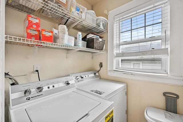 laundry area with washer and dryer