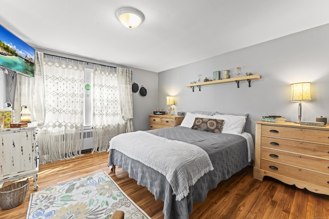 bedroom featuring wood finished floors