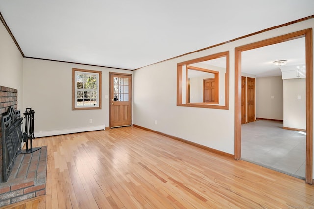 unfurnished living room featuring a baseboard radiator, baseboards, light wood-type flooring, a brick fireplace, and crown molding