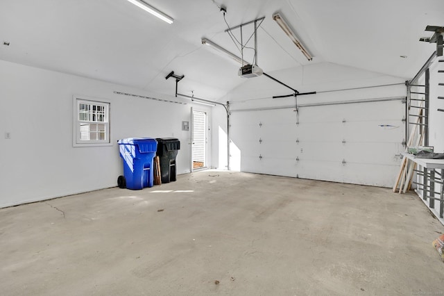 garage featuring a garage door opener