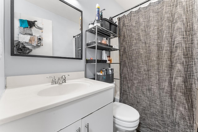 full bathroom with shower / bathtub combination with curtain, vanity, and toilet