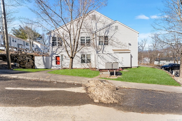 view of front of property with a front lawn