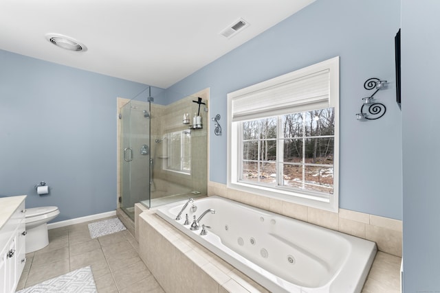 bathroom with visible vents, tile patterned flooring, vanity, a jetted tub, and a shower stall