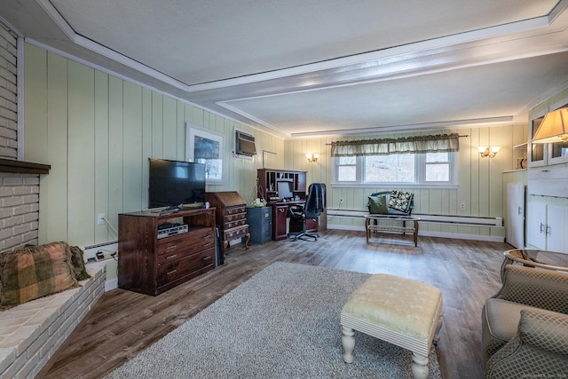 living area featuring a wall mounted air conditioner and wood finished floors