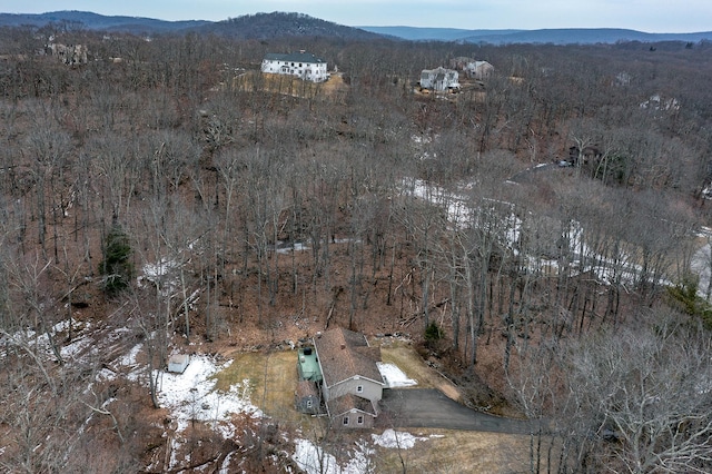 aerial view with a mountain view and a forest view