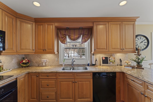 kitchen featuring light stone countertops, a sink, brown cabinets, black appliances, and tasteful backsplash