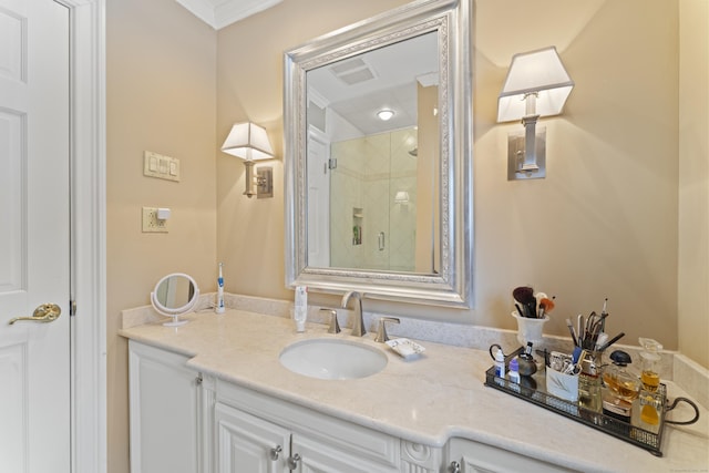 bathroom featuring a shower stall, visible vents, and vanity