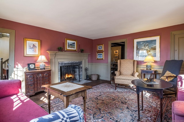 579 Taugwonk Rd, Stonington, CT 06378 - living area with a premium fireplace and wood finished floors