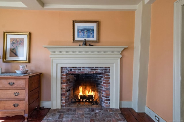 579 Taugwonk Rd, Stonington, CT 06378 - detailed view of a brick fireplace and baseboards