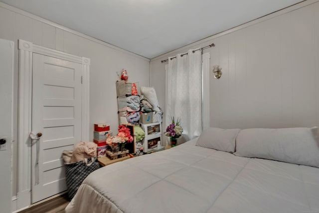 bedroom featuring wood finished floors