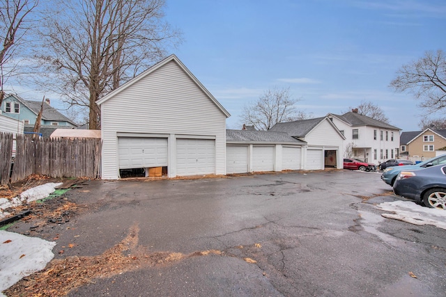 garage with fence