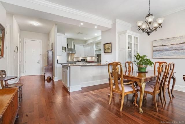 dining space with baseboards, ornamental molding, dark wood-type flooring, a notable chandelier, and recessed lighting