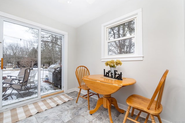 dining room with baseboards